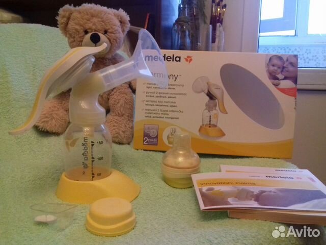 Молокоотсос Medela harmony 2-х фазный +накладки Av