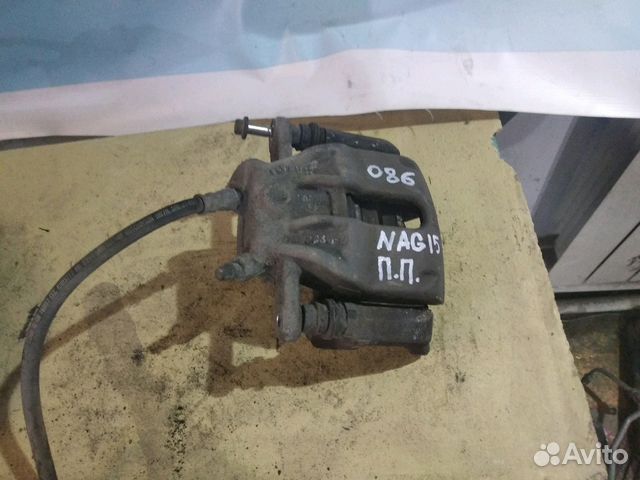 Суппорт тормозной Ниссан Альмера G15