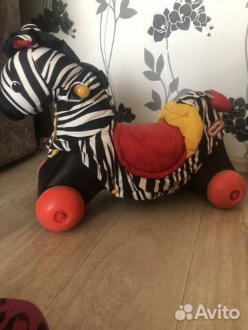 Игрушка каталка