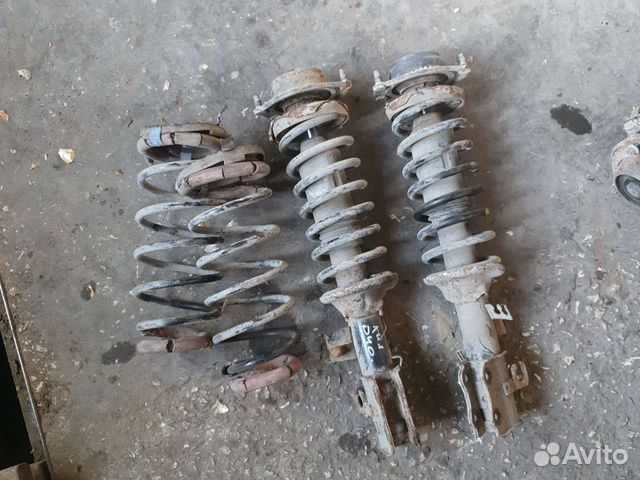 Стойка амортизатора задняя Kia Rio 1