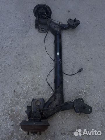 Балка задняя,ступицы мазда демио