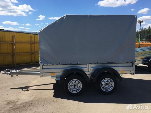 Легковой двухосный прицеп с высоким тентом