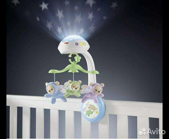 Мобиль с проектором в кроватку
