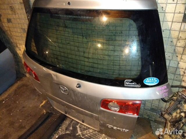 Дверь багажника Mazda Demio DY