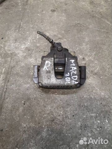 Суппорт тормозной передний правый Mazda 3 BL