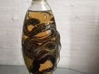 Декоративная бутылка со змеями