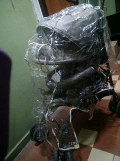 Дождевик на прогулочную коляс