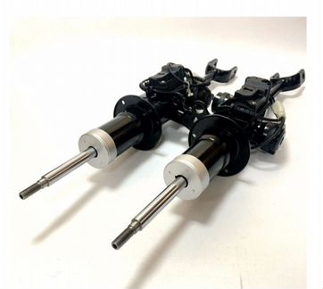 Амортизаторы передние BMW 7